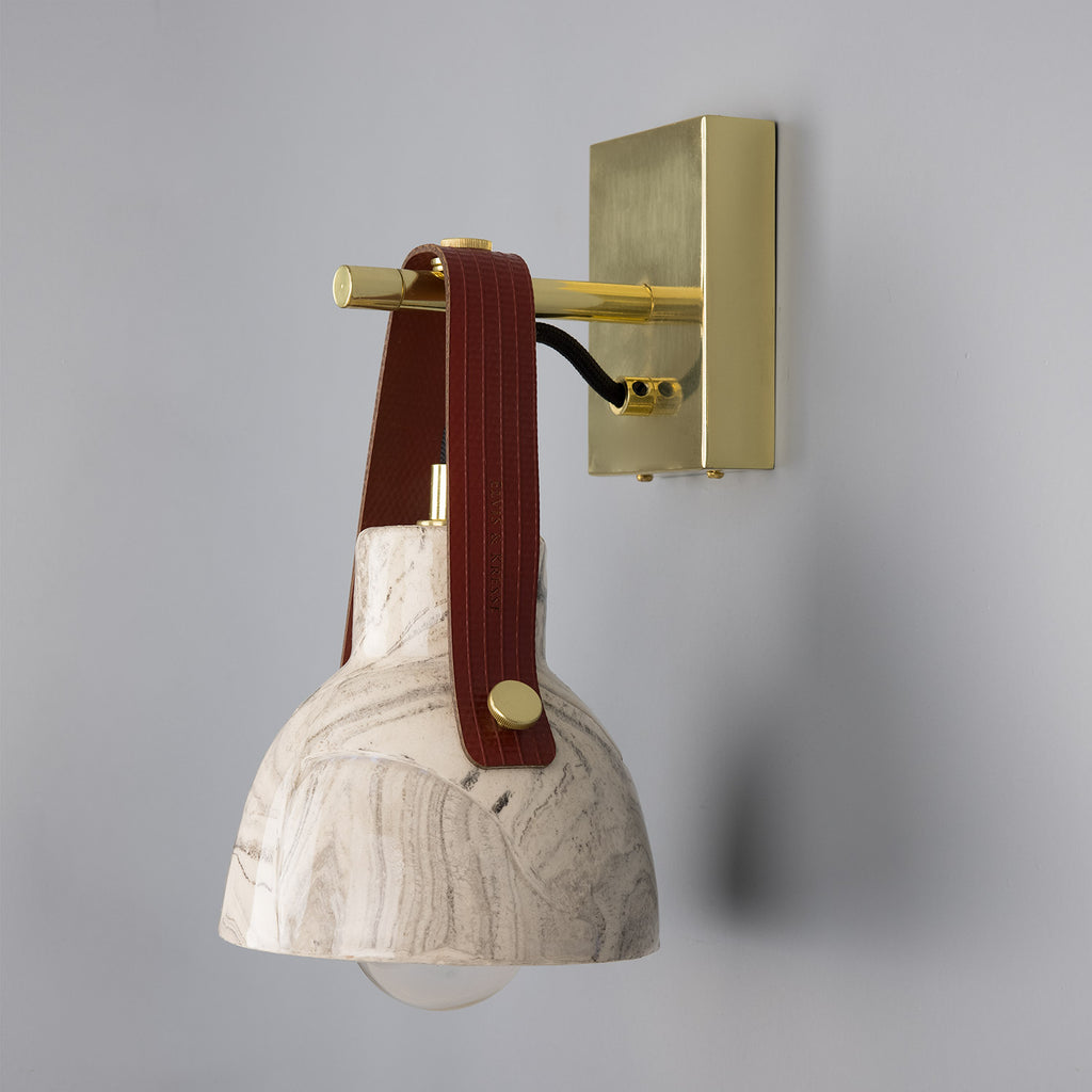 Nagi Marbled Ceramic Wall Light with Red Rescued Fire-Hose Strap, Polished Brass